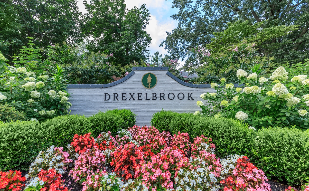 Drexelbrook Sign surrounded by flowers